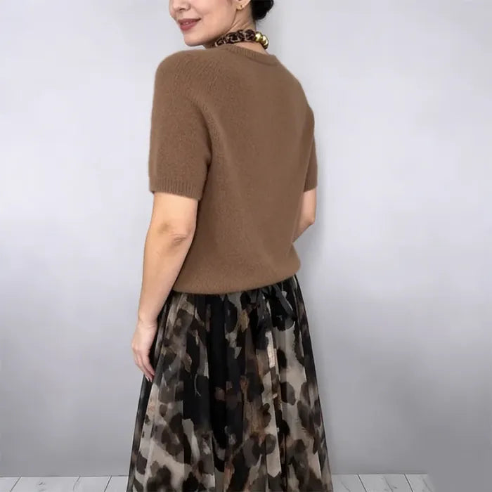 Women's sweater and leopard skirt set