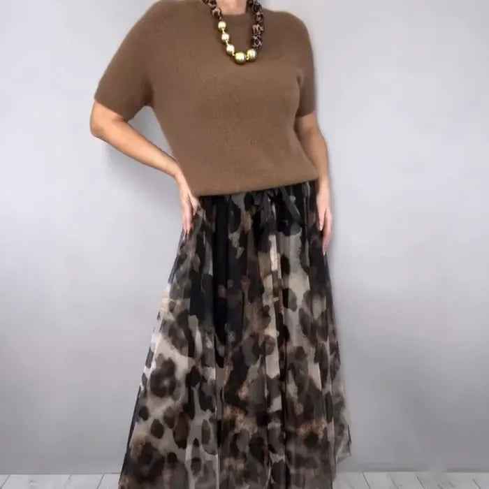 Women's sweater and leopard skirt set